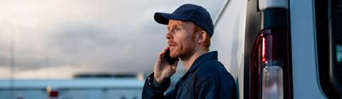 Man in front of truck